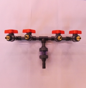 Verteiler 4 fach 20mm mit Absperrungen/Rückschlag